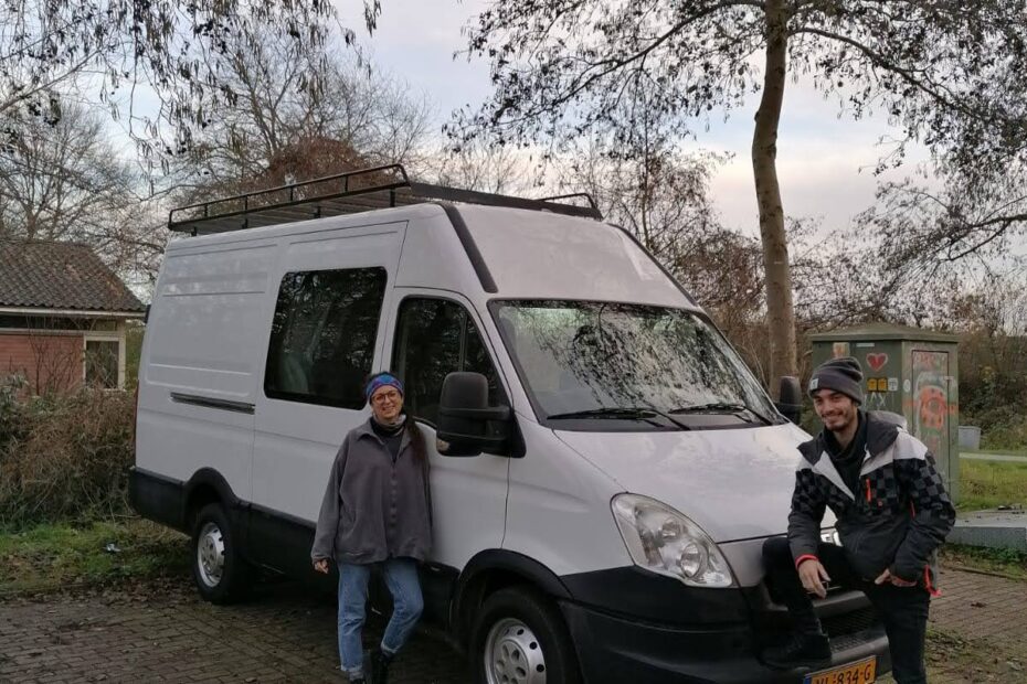 Carmen and Antoine posing in front of their Iveco Daily H2L2 van in Wageningen (NL)